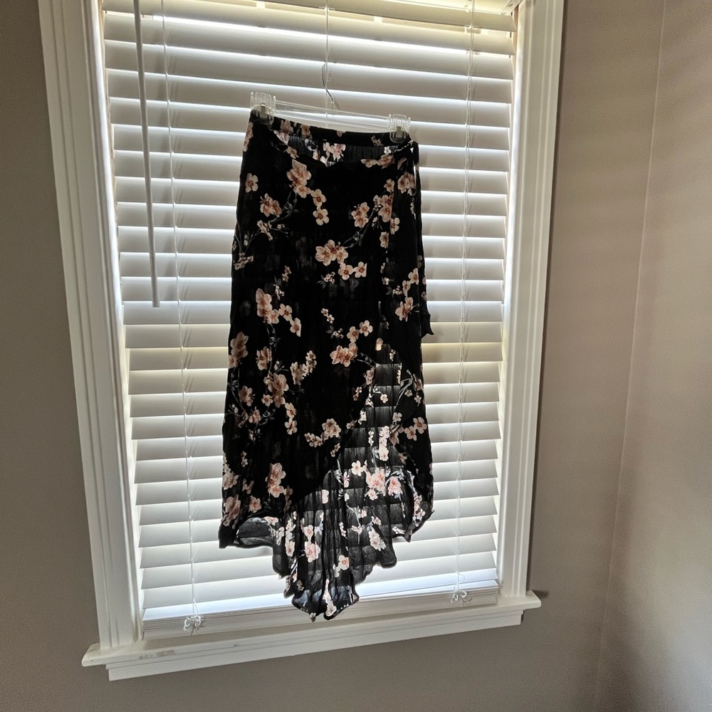 Black stretchy wrap skirt with white/pink flowers and side tie
